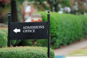 This is a stock image of an admissions office sign at a public university.