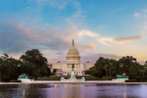This is a stock image of a government building in Washington D.C during sunset or sunrise.